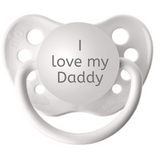 A white silicone pacifier with the engraved text 'I love my Daddy' on the top.
