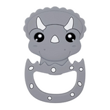 A silicone teether in the shape of a gray dinosaur with a friendly face design, featuring large eyes and a small mouth opening.
