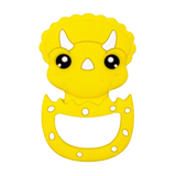 A silicone teether in the shape of a yellow dinosaur with a friendly face design, featuring large eyes and a small mouth opening.