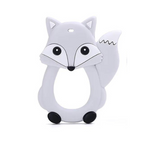 A gray silicone fox-shaped teether with a ring in the middle for easy grip.
