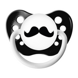A black pacifier with a silicone orthodontic nipple and a cap designed to resemble a stylized mustache, intended for infants.