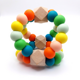 Triangle Orbit Teething Toy - Orange, Yellow and Greens